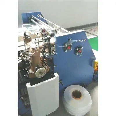 Машина за рязане и шев с двойно зашиване